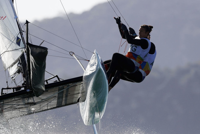 RIO DE JANEIRO, BRAZIL - AUGUST 13: Santiago Lange of Argentina and Cecilia Carranza Saroli of Argentina compete in the Nacra 17 Mixed class on Day 8 of the Rio 2016 Olympic Games at the Marina da Gloria on August 13, 2016 in Rio de Janeiro, Brazil. (Photo by Clive Mason/Getty Images)