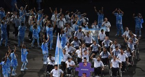 RIO DE JANEIRO, BRAZIL - SEPTEMBER 07: Flag bearer Gustavo Fernandez of Argentina leads the team entering the stadium during the Opening Ceremony of the Rio 2016 Paralympic Games at Maracana Stadium on September 7, 2016 in Rio de Janeiro, Brazil. (Photo by Atsushi Tomura/Getty Images)